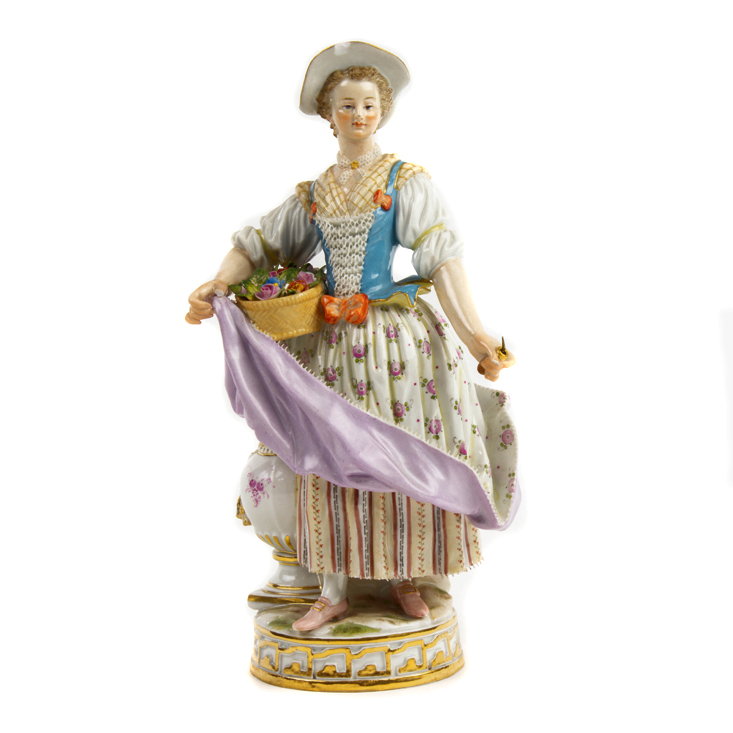 A MEISSEN FIGURE OF A LADY WITH