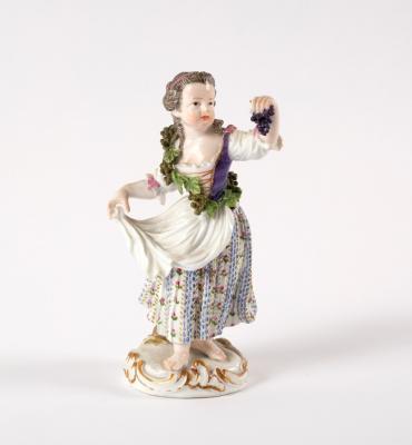 A Meissen figure of a girl with