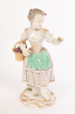 A Meissen figure of a girl with a