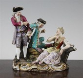 A Meissen group of two gentlem