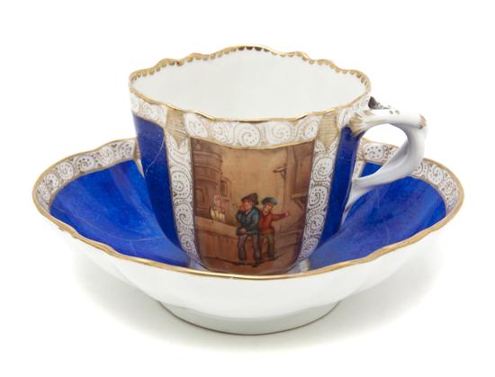 *A Meissen Porcelain Cup and Saucer
