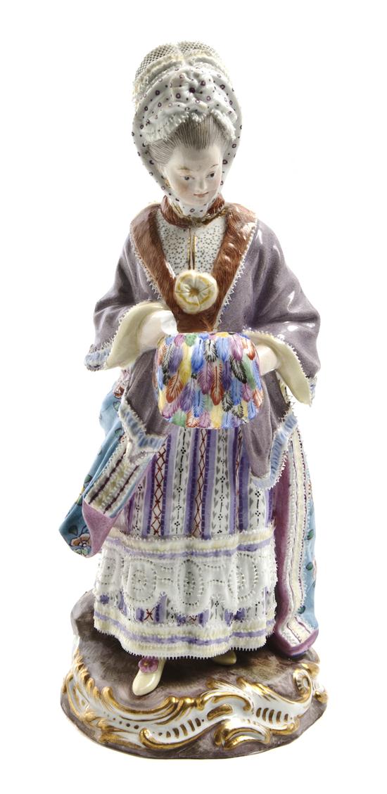*A Meissen Porcelain Lace Figure