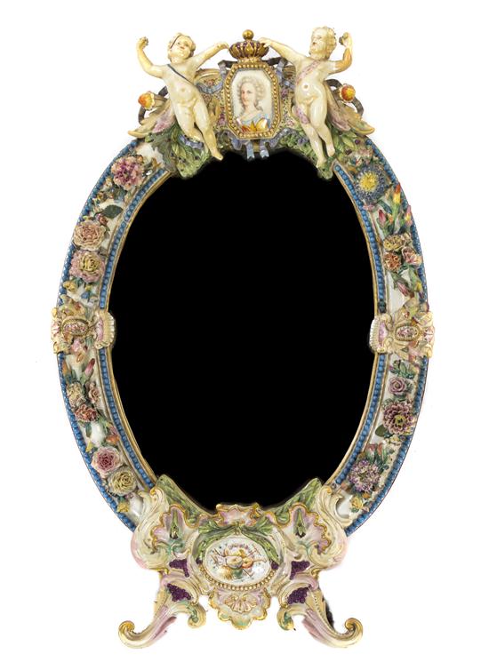 * A Meissen Porcelain Mirror having