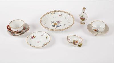 A Meissen strainer painted bouquets