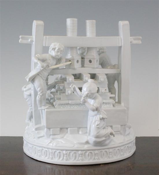 A Meissen white glazed group of a