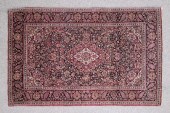 A Meshad rug of Kashan design