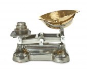 A METAL GROCERY SCALEA metal g