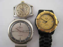 A metal Heuer quartz movement