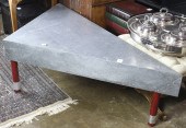 A METAL WRAPPED TRAPEZOIDAL OC