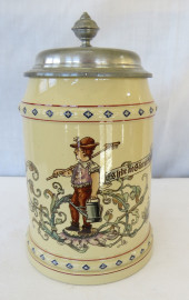 A METTLACH STEIN - GARDENER IN