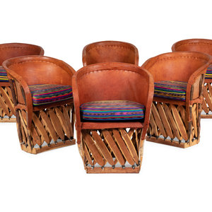 A Mexican Equipale Dining Table and