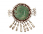 A MEXICAN SILVER BROOCH WITH G