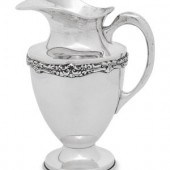 A Mexican Silver Pitcher 
Eddi
