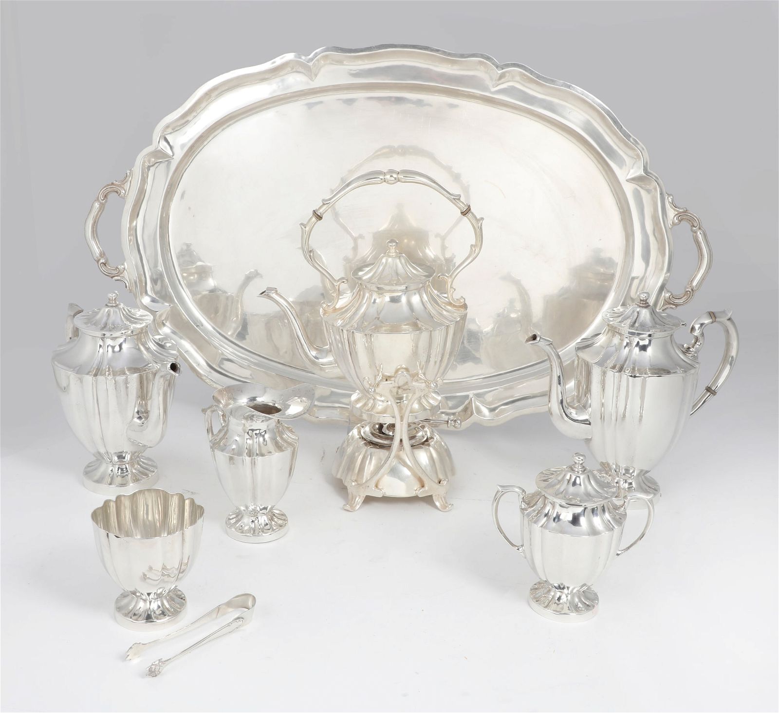 A MEXICAN STERLING SILVER TEA AND