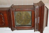 A mid 18th century oak eight-d