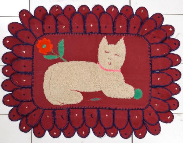A MID 20TH CENTURY FOLK ART WOOL