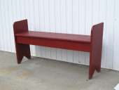 A MID-CENTURY BUCKET BENCH IN
