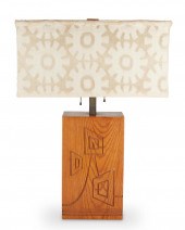 A MID-CENTURY MODERN CARVED WO