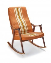 A MID-CENTURY MODERN TEAK ROCK