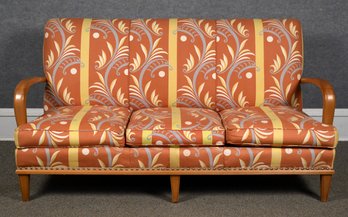 A mid-century sofa with with