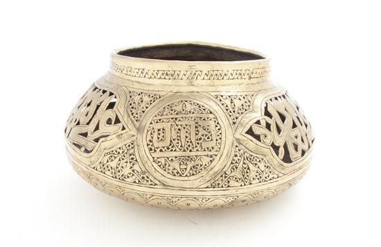 * A Middle Eastern Brass Bowl of