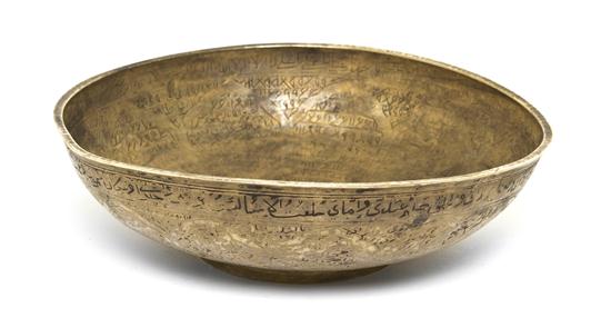 A Middle Eastern Brass Bowl of