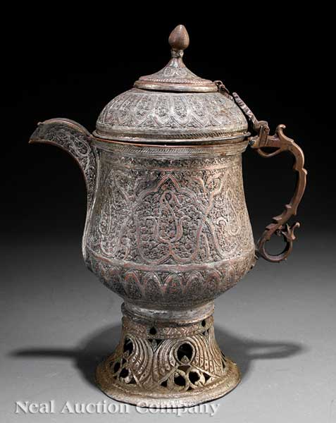 A Middle Eastern Copper Ewer