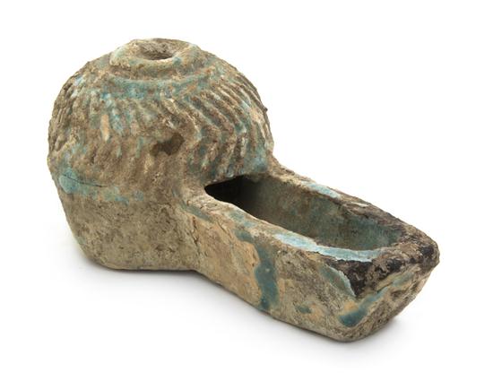 A Middle Eastern Pottery Oil Lamp