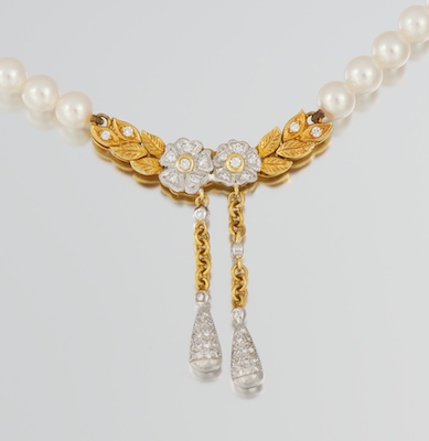 A Mikimoto Pearl 18k Gold and