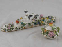 A miniature bowl and cover