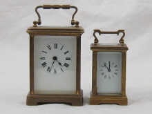 A miniature brass carriage clock