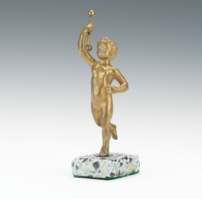 A Miniature Cast Bronze Figure of a