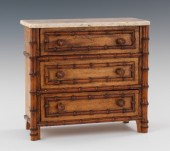 A Miniature Chest of Drawers w