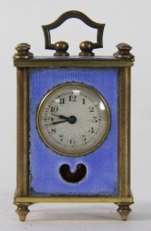 A miniature gilt brass cased a