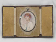 A miniature on card of a lady circa