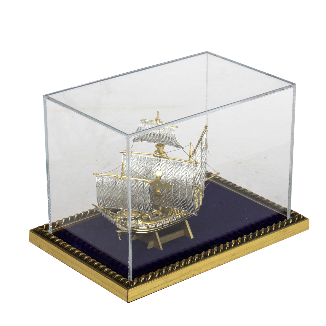 A MINIATURE SILVERED METAL MODEL OF