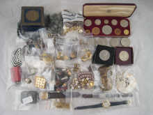 A mixed lot comprising a silver fob