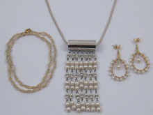 A mixed lot comprising a pearl