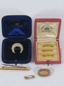 A mixed lot comprising three