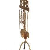 A Mizner Brass Fireplace Tool