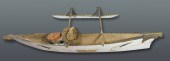 A MODEL OUTRIGGER CANOE USED F