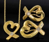 A modern 18ct gold open heart