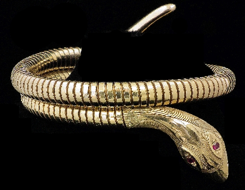 A modern 9ct gold serpent pattern