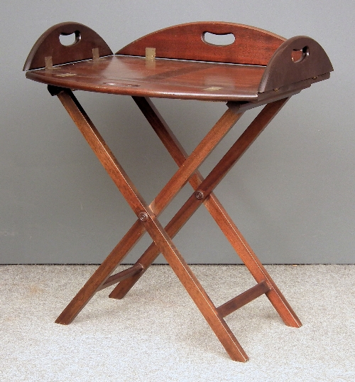 A modern butler's mahogany oval