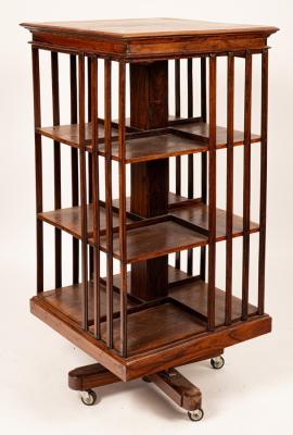A modern dark wood revolving