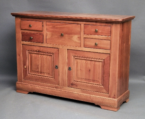 A modern figured wood sideboard