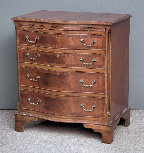A modern mahogany serpentine
