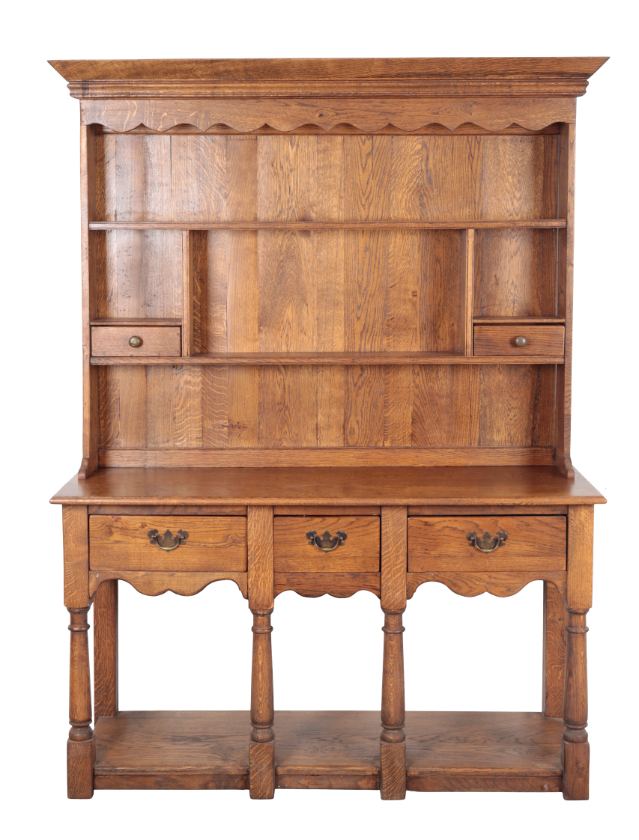 A MODERN OAK DRESSER of traditional