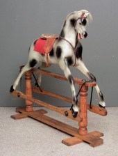 A modern painted wood dapple g