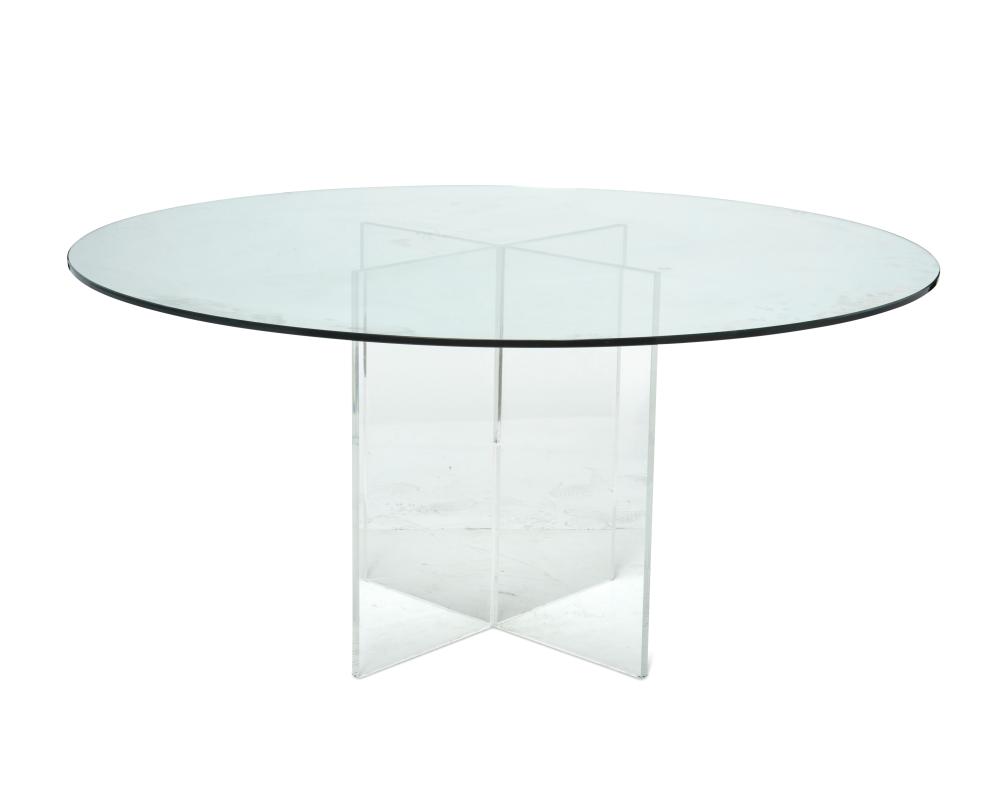 A MODERN PEDESTAL DINING TABLEA